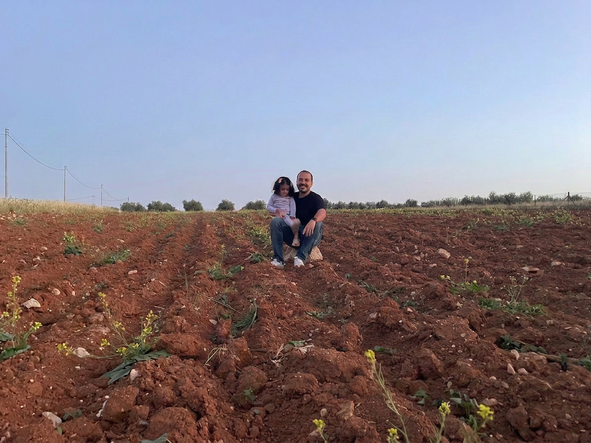 Father and child in a field